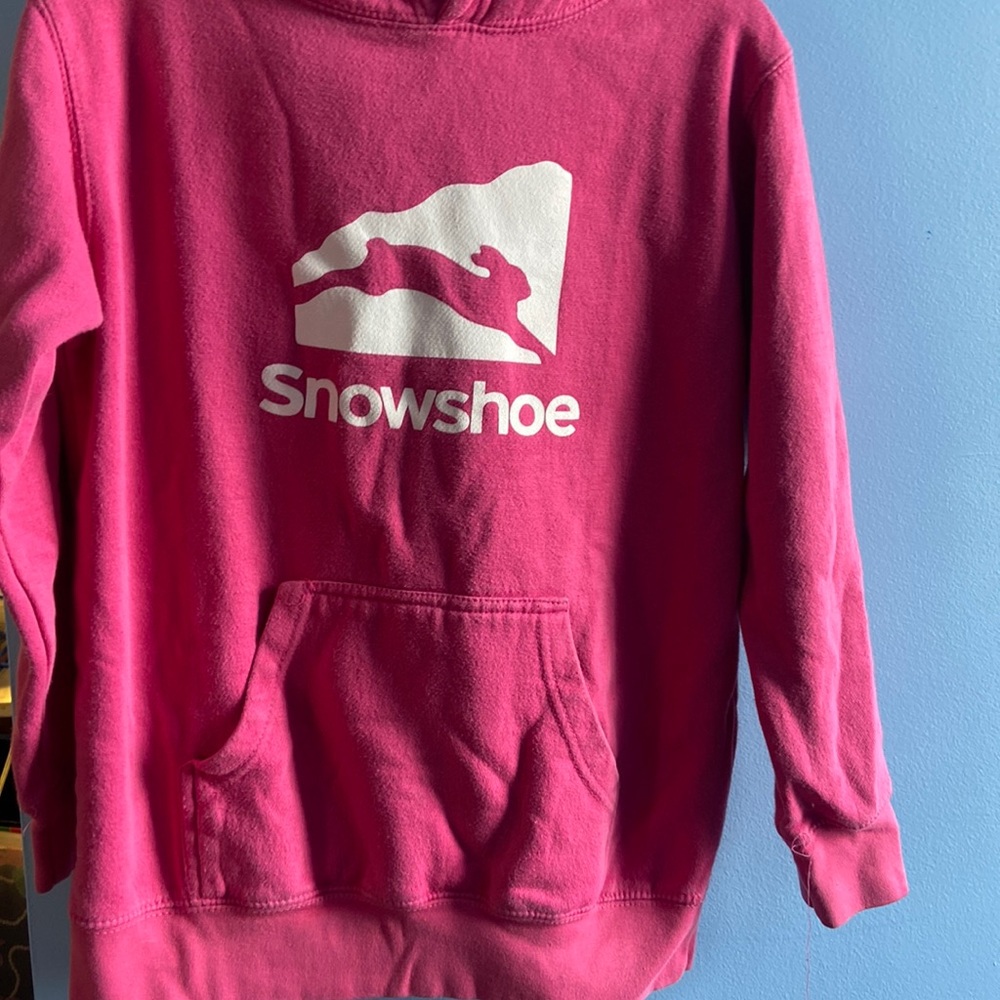 A pink snowshoe sweatshirt from snowshoe West Virginia